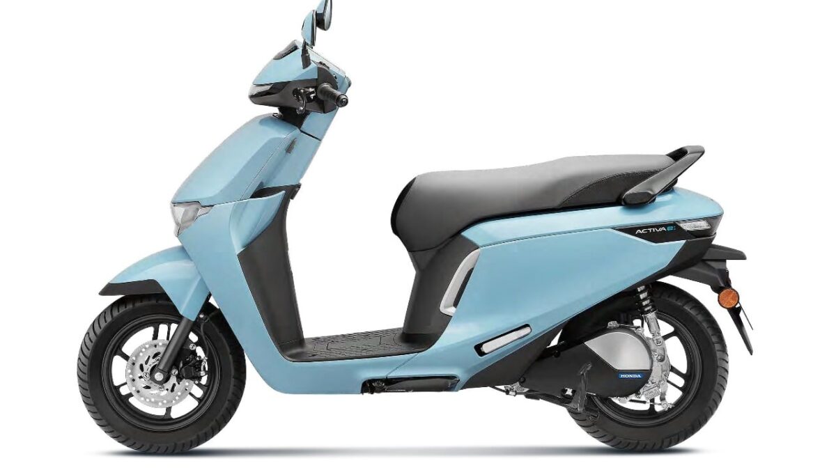 honda activa e scooter side